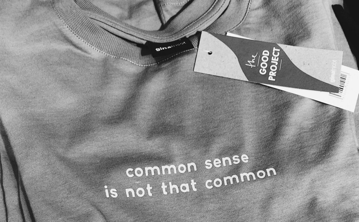 Image of a t-shirt that has the caption "common sense is not that common"
